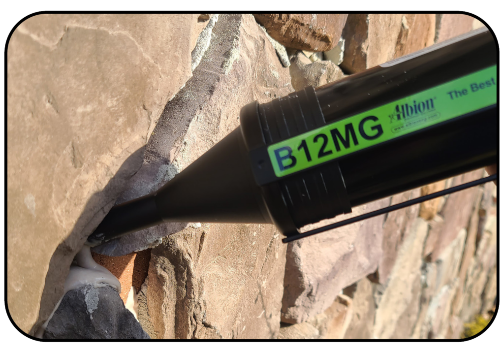 Albion B12MG Mortar & Grout Gun in use on a stone surface