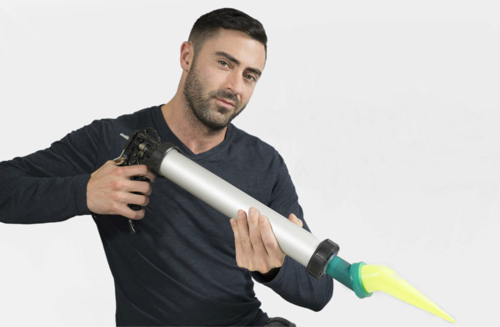 Man wearing dark colored shirt using Albion's BeadScope 360 Nozzle
